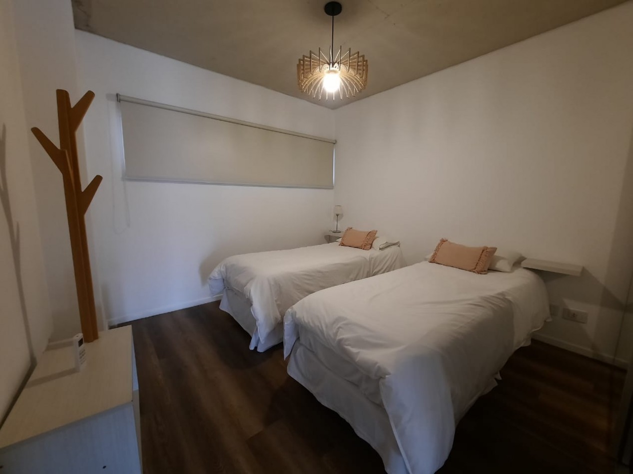Departamento de 3 ambientes con cochera y baulera.